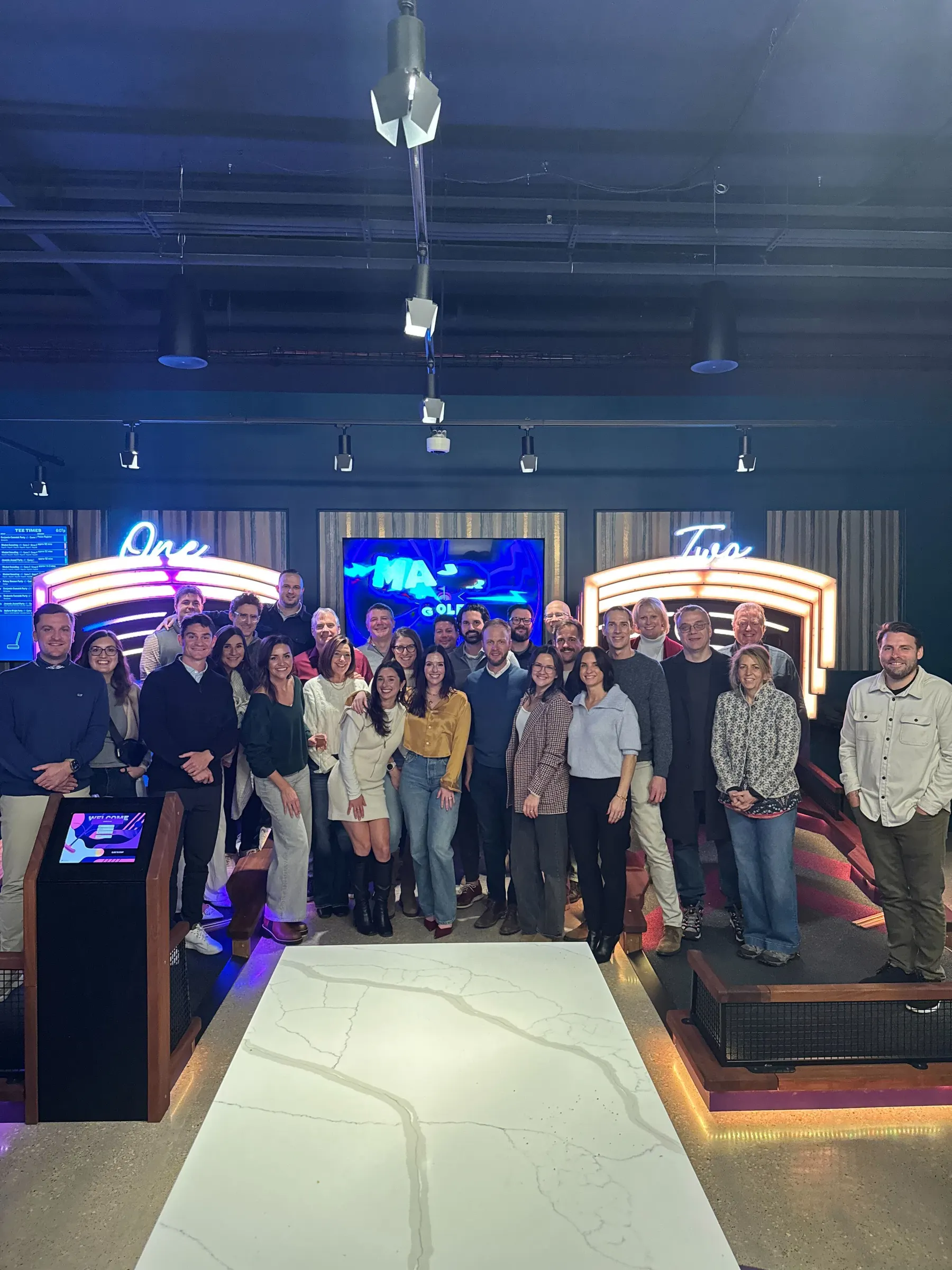Mindset colleagues laughing during a team bowling night
