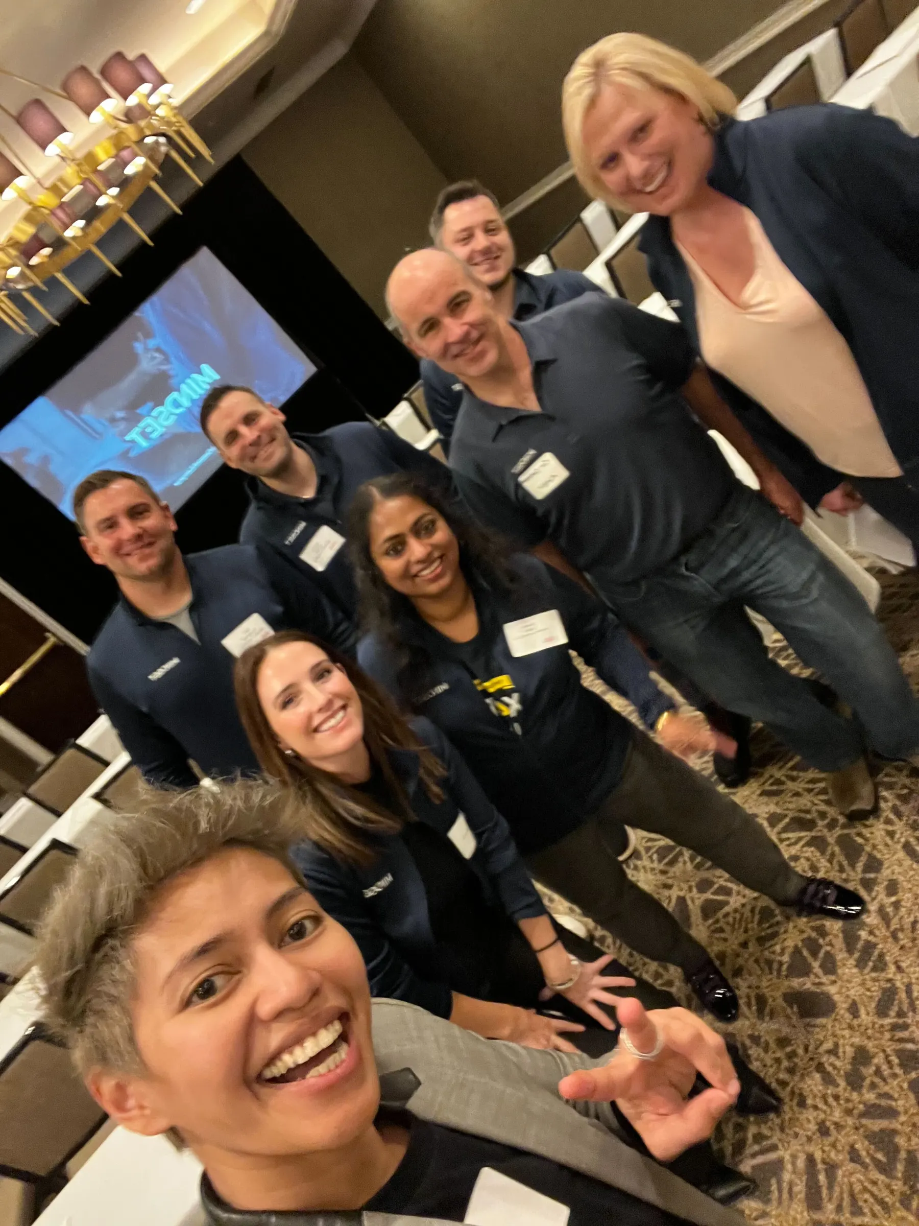 Team members celebrating at an office event in the Minneapolis North Loop office