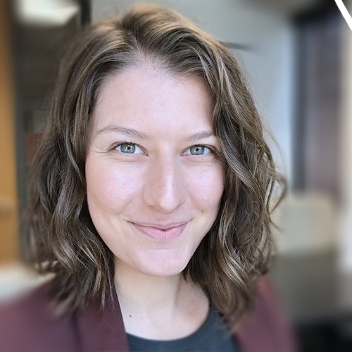 Professional woman smiling at SAP consulting firm office