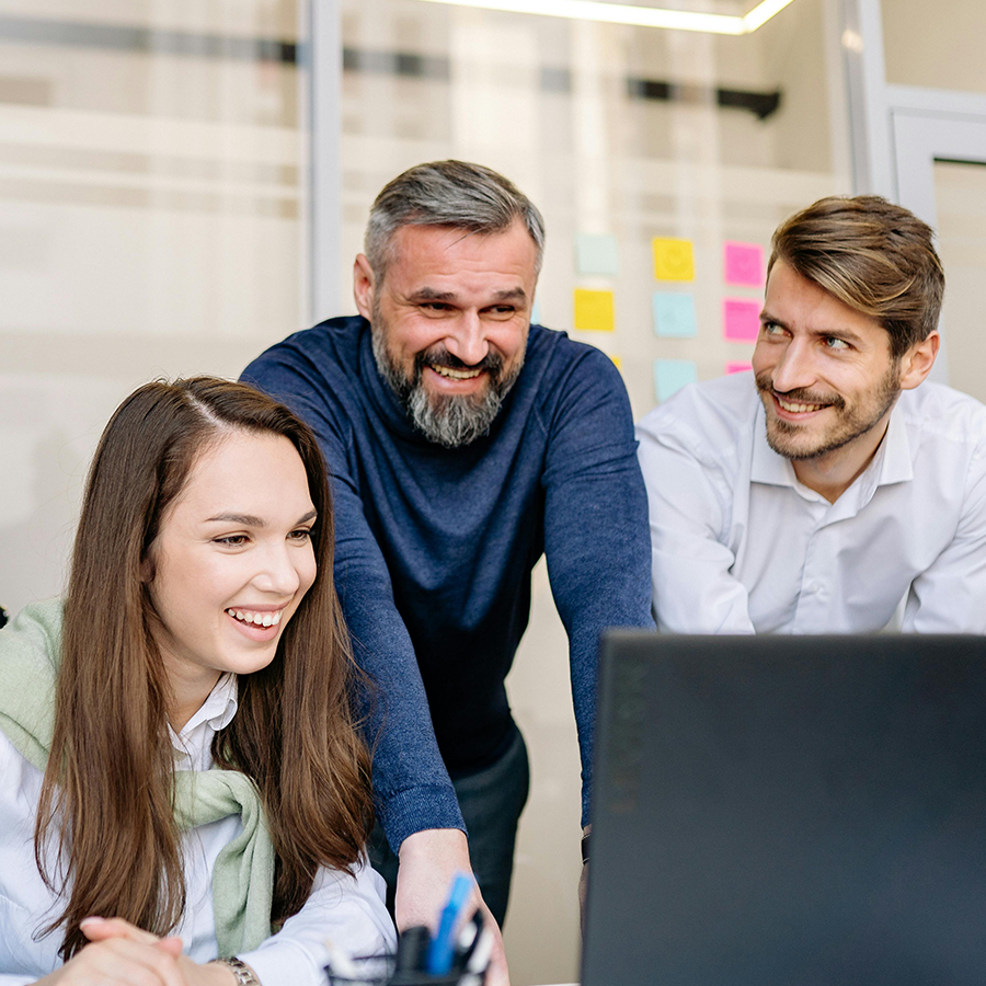 SAP consulting team collaborating on BTP strategy and integration solutions at modern office workspace