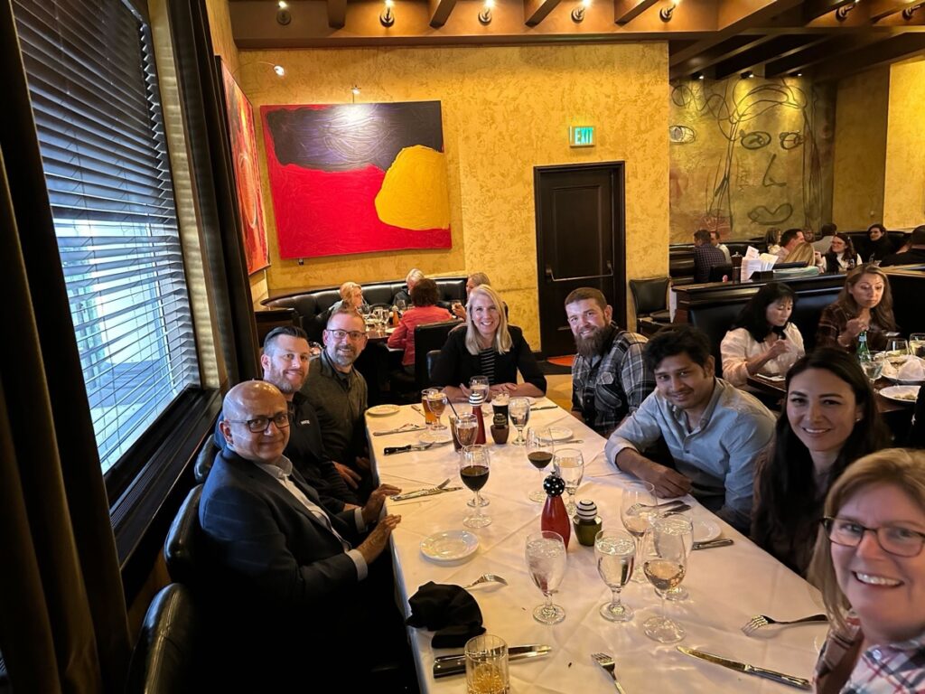 Mindset and Cargill team members together at a dinner during the engagement.